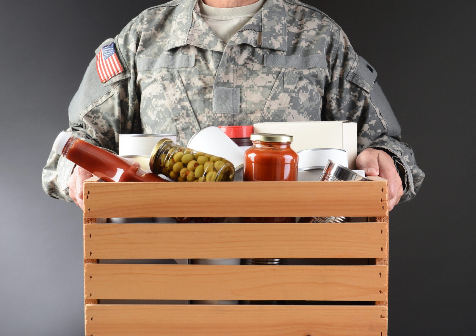 Soldier Holding Food Drive Box